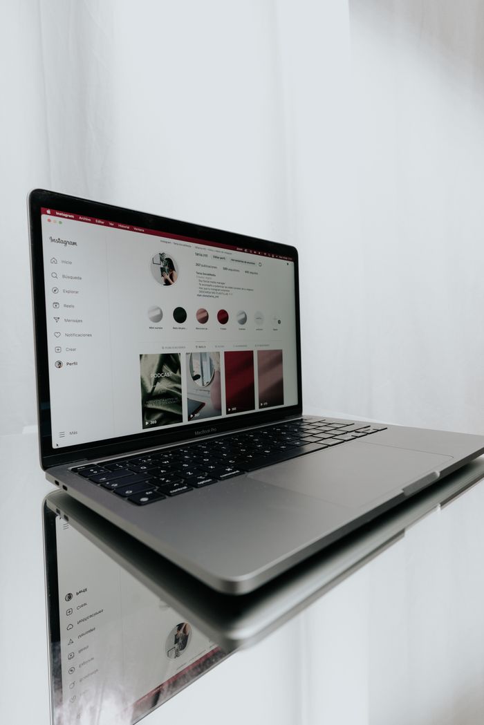 Sleek laptop displaying an Instagram profile, showcasing modern technology and online connectivity.